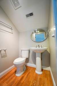 This adorable half bath is in an absolutely ideal place off of the bonus room! What a perfect use of space!