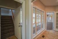 From the laundry room, you can head upstairs to the bonus room, into the garage, or back into the eat in kitchen.