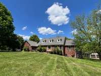 Beautiful all brick home on over an acre lot in desirable Shenandoah Estates!