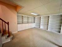 Full basement - beautiful built-in cabinets and shelving!