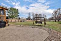 This concrete patio provides  ample room for outdoor activities, it's the perfect setting for creating cherished family memories! Grill and swing will convey! 209 Fieldstone Dr.   Murfreesboro, TN 37127