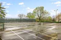 Multiple lit tennis courts....