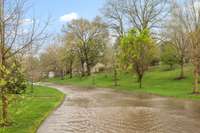 This is a wet weather creek that was dry when in the morning, then after the storm it had lots of running water, and then it was dry again the next day...such a cool feature of Sugartree!