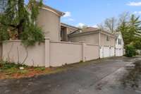 The back entrance into your double car garage is very private...you also have a pedestrian door from garage.