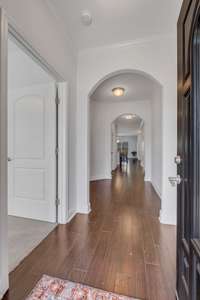 Beautiful entry with hallway.  Bedroom is on the left.