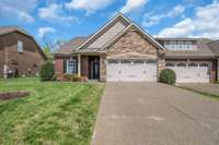 TWO CAR GARAGE WITH STORAGE INCLUDING CABINETS AND  Tool Organizer & Brackets .