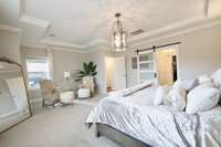 Bathroom and closet entry to the right with the custom sliding barn door. Peaceful and graceful space.