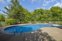 Overlooking the backyard and tree lined property line, this backyard is a true oasis.  Back yard gas an invisible fence for pets.