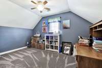 Use this flexible vaulted room as a nursery, study or additional closet space.  Located off the primary bedroom.