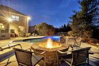 Enjoy this firepit conveniently located within the pool deck!  S'mores ready!