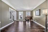 Wonderful floor to ceiling windows add great light to this space -  also with new hardwoods in 2019.