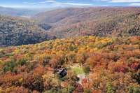 To get that view, the home had to be situated perfectly on the property near the mouth of the valley below.  From any other property, the view would be different.