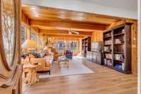 The main living area has a warm feeling with lots of wood tones fitting in perfectly with the timbered surrounding.