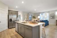 Farmhouse kitchen sink with a magnificent island.