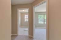 Bedroom #2 and Utility Room  *Photo is of a previously built Picchu in another Dalamar Homes community. Selections and Standard Features may vary.*