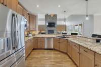 Stainless steel appliances with a spacious granite countertop.  The sink was recently replaced as well.