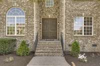 The double wooden entry doors are only the beginning to the luxuries this home as to offer.