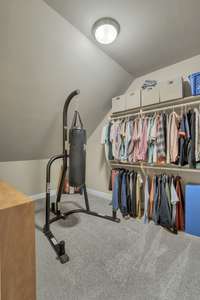 Primary Suite closet with laundry chute to downstairs