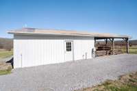 Front of Workshop with Water Hydrant and crushed gravel