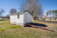 West Shed with ramp.  Large enough to store a car!