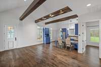 Cased wood beams accent the main living area of the Guest House.