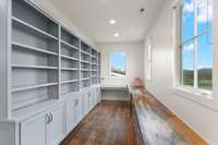 Amazing work surface and custom built-ins featured in this huge nook.