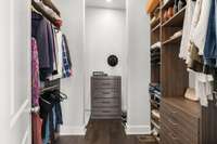 Custom walk-in closet off master bedroom.