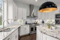 Beautiful granite countertops and luxury appliances.