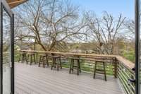 Enjoy a peaceful moment on the main level porch.