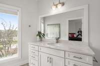 Oversized vanity and natural lighting for Guest bedroom #2.