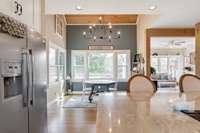 Kitchen facing the dining area and sun room to the right.