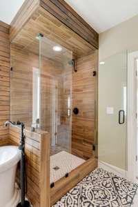 Frameless glass shower.