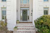 Recently renovated English country styled home front entrance.