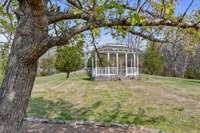 Gazebo on the side of the home.