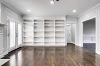 Built in bookcases and hallway to the Master Bedroom and Bath