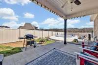 This partially covered concrete patio is the perfect place to enjoy some fresh air!  Ceiling fan is great for warm days! 1133 Corona Ct   Lascassas, TN 37085