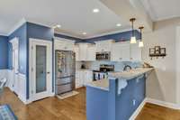 Adorned with sleek recessed lighting, this kitchen also boasts a built-in pantry and state-of-the-art appliances! 1133 Corona Ct   Lascassas, TN 37085