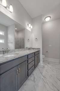 Owners Bathroom   *Photo is of a previously built Riviera & another Dalamar Homes Community. Standard features & selections may vary.*
