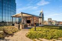The Sky Garden, accessible from the private residents' lounge only, delightfully offers lush landscaping overlooking the skyline, Nissan Stadium, and the Cumberland River.
