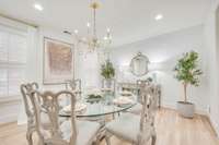 Stunning Dining Area wide open to kitchen and den. Great for large families or entertaing