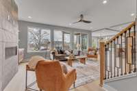 Fireplace & View of the Living Room, Kitchen and Dining area. Open to Just one of the large Decks with great views!