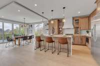 Custom designed kitchen! Upgraded Cabinets and Designer Tile Backsplash!