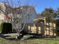 Trellis above right side gate