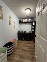 Laundry room with lots of storage and hanging - Second Level