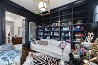 Currently used as a comfortable and private reading room - built in bookcases across the back wall