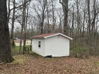 Separate Building near Spring Fed year around small creek.