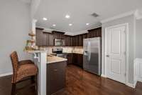 WEEKDAY DINNERS AND BIG HOLIDAYS ARE NO MATCH FOR THIS BEAUTIFUL KITCHEN AND LARGE PANTRY! AND YOUR NEW BREAKFAST BAR IS PERFECT FOR A QUICK MEAL OR CHAT WITH THE CHEF