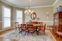 Spaciouis dining room features a bay window, lending ample room for additional table if needed