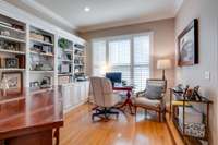 Living Room/Office with built-ins & hardwood floors with inlay border