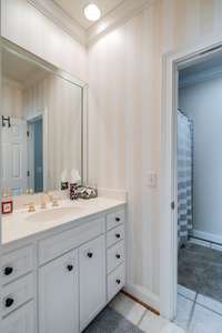 Double vanity bath connects 2 of the 3 upstairs bedrooms